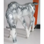 Sculpture Grazing foal Grey in apples. Lomonosov