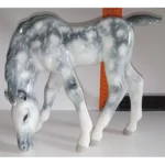 Sculpture Grazing foal Grey in apples. Lomonosov