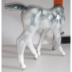 Sculpture Grazing foal Grey in apples. Lomonosov